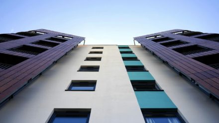 external view looking up at a block of flats