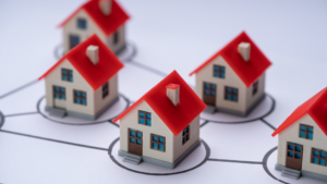 grapic image of small houses with red roofs